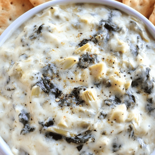 Easy Slow Cooker Cheesy Spinach Artichoke Dip