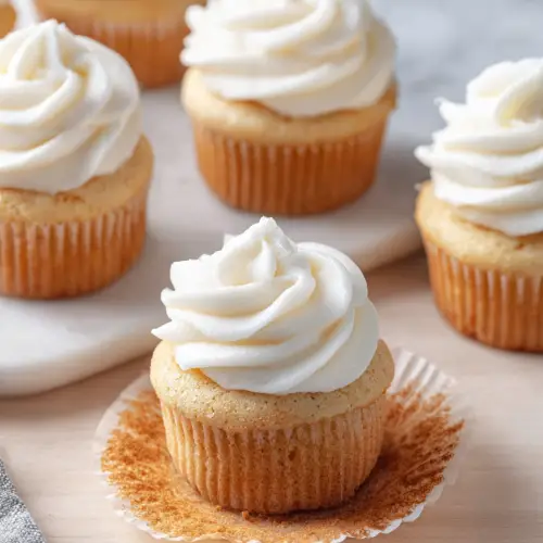 Delish Vanilla Cupcakes with Cream Cheese Frosting