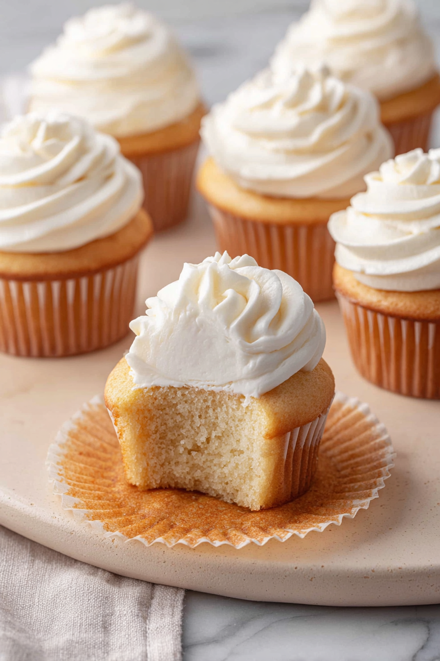 Delish Vanilla Cupcakes with Cream Cheese Frosting